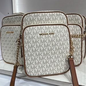 Michael Kors, Bags, Michael Kors Jet Set Travel Ns Chain Medium Logo  Crossbody Bag Vanilla Color